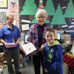 Rotarian Rochelle, Barbara Hughes and a Greywolf student. Photos from Rotary Club of Sequim archive files