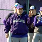 Sequim Wolves head baseball coach Dave Ditlefsen (center) gives his team instructions and advice before running a drill at a March 4 practice at Sequim High School. Sequim Gazette photo by Conor Dowley