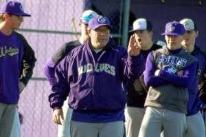 Sequim Wolves head baseball coach Dave Ditlefsen (center) gives his team instructions and advice before running a drill at a March 4 practice at Sequim High School. Sequim Gazette photo by Conor Dowley