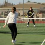 Doubles team partners Kalli Wiker (foreground) and Jessica Dietzman, pictured at a preseason practice in early March, looked to defend their 2A title this spring; the 2019-2020 school year closure ended their season before it began and ended Dietzmans prep sports career. Sequim Gazette file photo by Michel Dashiell