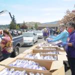 Sequim High School staff and other school advocates come out to celebrate the Class of 2020 at the SHS campus on May 4. Seniors picked up their caps and gowns for an as-yet-to-be-determined graduation ceremony. See more photos from the event online at cmg-northwest2.go-vip.net/sequimgazette. Sequim Gazette photos by Michael Dashiell