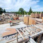 Konnor Parrish, an intern with Swinerton construction, moves wall reinforcing steel at the construction site of the new hotel at 7 Cedars Resort Casino Hotel in June 2019. Plans to hold a soft opening for 7 Cedars Casinos new hotel set for this spring have been postponed. File photo by Jesse Major/Olympic Peninsula News Group