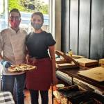 Andrea and Megan Mingiano, newcomers to the community who are passionate the art of authentic Italian, handcrafted, stone-fired pizza, bring Ulivo Pizzeria to the Sequim Farmers & Artisans Market. Photo by Emma Jane Garcia