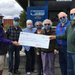 Milestone: Kiwanis Club donates to Sequim Food Bank