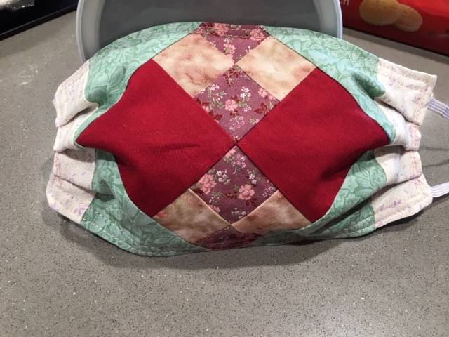 Philomena Lund of the Sunbonnet Sue Quilt Club helped bring in more than 900 kits for people to make their own face masks. Shes also begun using quilt blocks to cut out face masks, which Lund says makes for some pretty elegant masks. Photo courtesy of Philomena Lund