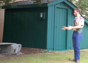 Ian Thill stands near his Eagle Scout project last year where he restored a shed and installed a bench in Pioneer Memorial Park. Sequim Gazette file photo by Conor Dowley