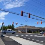 Crewmen with Olympic Electric continue work on new traffic lights at the intersection of North Fifth Avenue and West Fir Street this week to have the lights working by June 16. Sequim Gazette photo by Matthew Nash