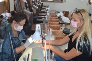 Anna Nguyen helps Kaliegh Galvin with her finger nails on June 1 inside Kims Nails, 181 W. Washington St. The business reopened that day after being closed due to the Stay Home, Stay Safe, state order. Galvin said she has been coming there for two years and planned to come back once it reopened. Sequim Gazette photos by Matthew Nash