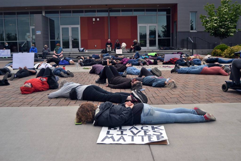 On June 5, more than 130 people gather in front of the Sequim Civic Center for a vigil to grieve black people who have died from police violence. Sequim Gazette photos by Matthew Nash