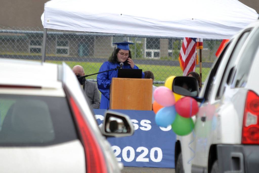 Lily Engeset, at podium, was one of six Olympic Peninsula Academy students to speak and be honored for graduating on June 12 at an outdoor ceremony. Sequim Gazette photo by Matthew Nash