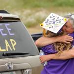 New Sequim High graduate Kaylee Dunlap get a hug from dad Tracy following the SHS commencement ceremony on June 19. Sequim Gazette photo by Michael Dashiell