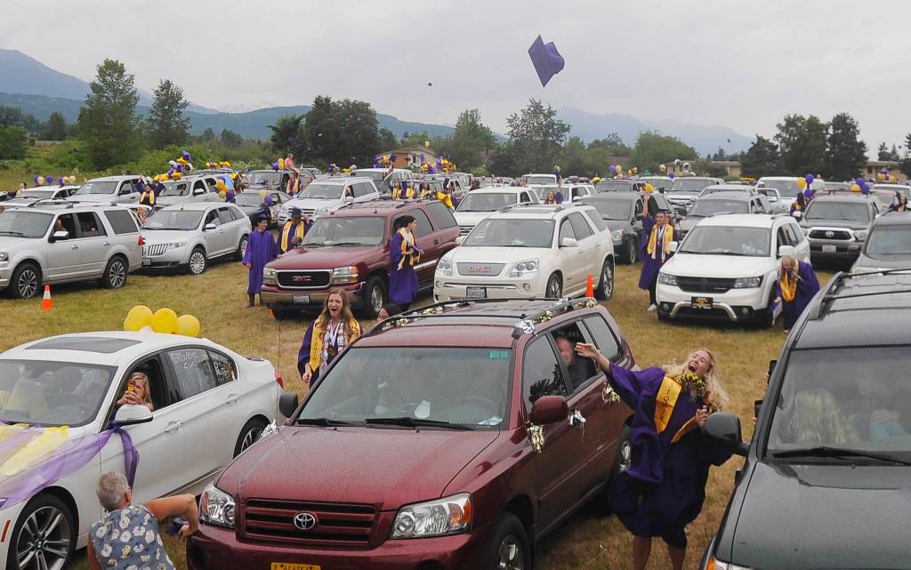 Sequim High seniors celebrate at the conclusion of their graduation ceremony on Friday, capping a school year that saw students move to remote learning in mid-March. Sequim Gazette photo by Michael Dashiell