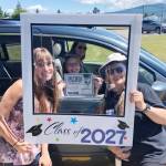 Greywolf Elementary fifth-grader Mikylah Lanning poses for a graduation photo with teachers Nathalie Maynock and Teresa Iversen on June 17. Along with certificates and photos, graduating fifth-graders got a free yearbook courtesy of Greywolf PTA. Photo by Darcy Lamb