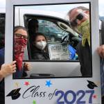 Greywolf Elementary fifth-grader Abbygayle Brittell Brown poses for a graduation photo with teachers Ashley Kramer and Aaron Reno on June 16. Photo by Darcy Lamb