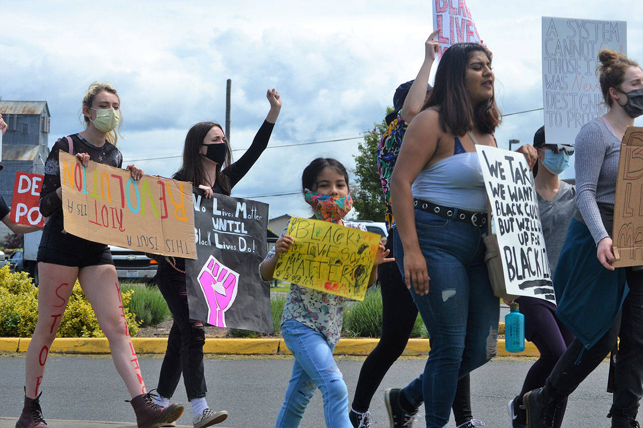 Dulce Maria Villegas, 5, marches with her family during a Black Lives Matter protest on June 4. She was one of about 200 people to march from downtown Sequim to River Road and back. Sequim Gazette file photo by Matthew Nash