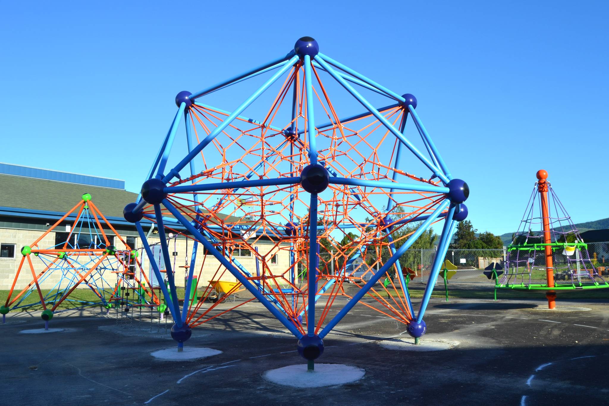 A new playground at the Sequim Boys & Girls Club tentatively finishes this summer as club leaders continue to seek funds for the play structures, a basketball court, turf and more. Plans for a playground date back at least to 2001, club supporters say. Sequim Gazette photo by Matthew Nash