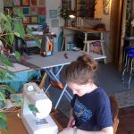 Ruby Romano, pictured here at work, sells her beadwork creations at the Sequim Farmers & Artisans Market. Submitted photo