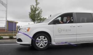 City of Sequim caps street rehab project with wheeled ribbon cutting