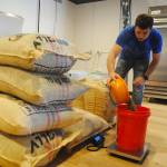 Above: Rod Dirks preps his new business Essence Coffee Roasters, 461 W. Washington St., for its soft opening last week. Left: Newly-hired store manager Ethan Jessee prepares a drink at Essence Coffee Roasters last week. I was lucky to find hm, Essence owner Rod Dirks says of Jessee. Sequim Gazette photos by Michael Dashiell