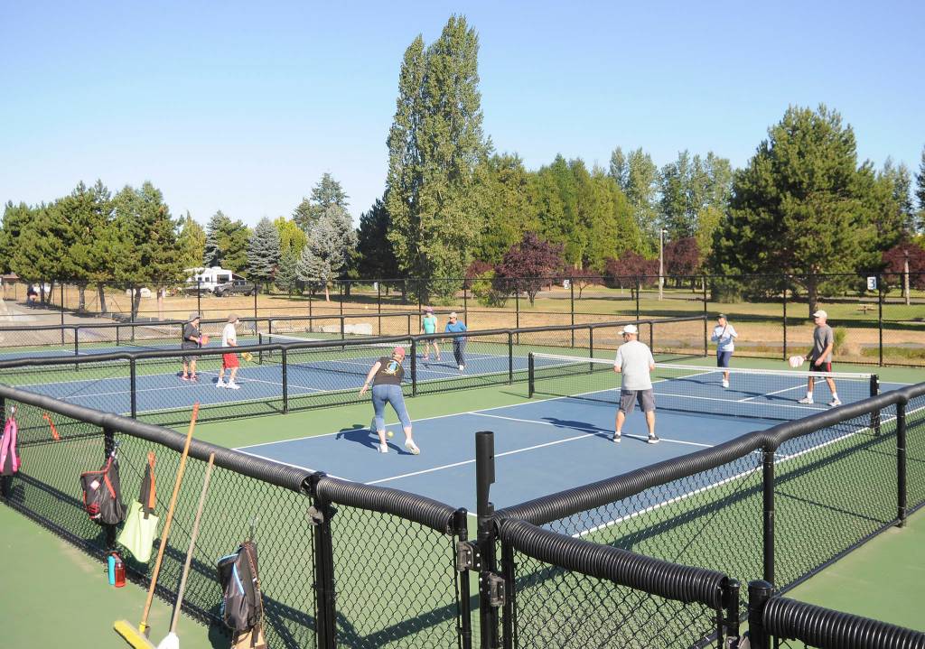 Players flock to the pickleball courts at Carrie Blake Community Park on Aug. 14. Sequim Gazette photo by Michael Dashiell