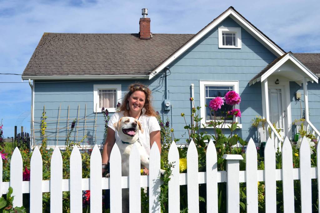 As a grade school student, Mikel Townsley told her mom some day shed live in this house on Cays Road. Years later, Mikel found the house through a friend and lives there with her mom Victoria and dog Tucker. Sequim Gazette photo by Matthew Nash