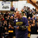 Myron Teterud, a 1960 Sequim High School graduate, gives the crowd a salute after being honored as Fan of the Century at Sequim High Schools centennial celebration in January 2011. Sequim Gazette file photo by Michael Dashiell