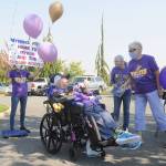 Members of the Sequim Alumni Association meet with Myron Teterud just outside Sequim Health & Rehabilitation Center on Sept. 8. Pictured with Teterud include, from left, Phyllis Meyer, Lorri Gilchrist and Loretta Bilow. Association members are advocating for naming the Sequim High School sports stadium in honor of Teterud, widely known for his avid interest and attendance at SHS sports events. Sequim Gazette photo by Michael Dashiell