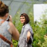 Photographer Cindy Roth snaps shots of Sequim model Aurora Lagattuta for Impact Fashions sustainable fashion show in the New Dungeness Nursery. The show debuts at impactfashion.org on Sept. 4. Sequim Gazette photo by Matthew Nash