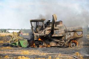 Combine fire ignites field blaze near Sequim airport