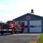 ABOVE: Diamond Point Fire Station 35 serves hundreds of homes with an all-volunteer crew with support from the Blyn Fire Station. RIGHT: Some of the volunteers at Diamond Point Station 35, include, from left, EMT Marydee Countryman, Lt. Mike Mingee, EMT Chaela Sumner, Firefighter/EMT John McKenzie, Firefighter/EMT Jeff Nicholas, and Firefighter/EMT Joe Carter. Not pictured are EMT Terry Woof and EMT Jay Jacobsen. Sequim Gazette photos by Matthew Nash
