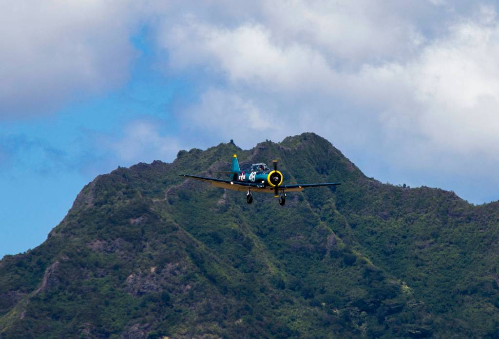 John Johnson and Dave Richardson look to make a landing at Wheeler Army Airfield, Hawaii, on Aug. 27 as part of the 75th anniversary of the end of World War II. Photo by Master Sgt. Andrew Porch/ 25th Infantry Division