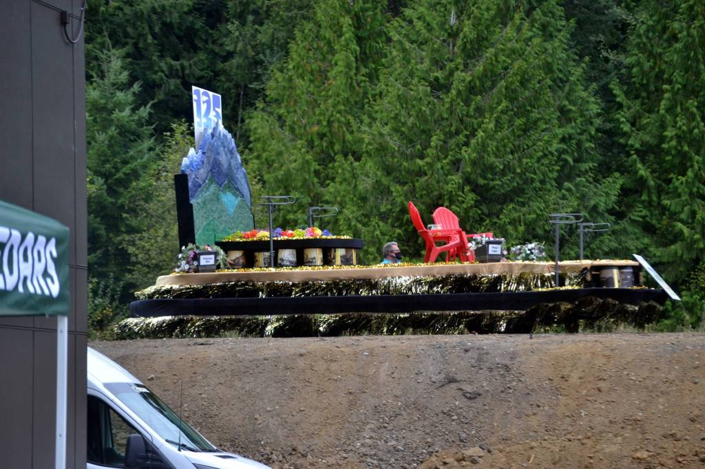 Guy Horton drives the Sequim Irrigation Festivals royalty float to the reveal party for royalty on Sept. 19. Sequim Gazette photo by Matthew Nash