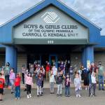 This ones for Donald: Youths at the Boys & Girls Club in Sequim hold up Pepsi cans in honor of Donald Kendall, a Sequim native and former PepsiCo CEO whose contribution during a 2000 capital campaign helped construct the facility thats named after his father. Kendall died on Sept. 19. Photos courtesy of the Boys & Girls Clubs of the Olympic Peninsula