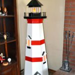 A large lighthouse brightens Ron DeGroats living room that he built in recent years. Hes made smaller versions with a few still available. Sequim Gazette photo by Matthew Nash