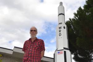 Sequim rocket man shares woodworking project on lawn