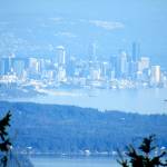 Downtown Seattle appears through the trees from Mount Walkers south viewpoint Sunday, Sept. 20. Photo by Rob Ollikainen/Olympic Peninsula News Group