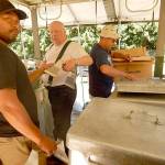From left, Makah Emergency Manager Rickson Kanichy, and Jim Buck, Joyce Emergency Planning and Preparation chairman Jim Buck and neighbor John Deluna conduct an inventory of an MKT-99 kitchen. Submitted photo