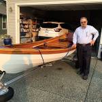 David Hough of Sequim stands by his wherry he built from a kit during the past few months. The Planet X saw its maiden voyage in Sequim Bay in late September. Submitted photo