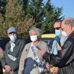 Prior to the procession on Oct. 10, Neil Clayton with the Sequim Pioneers Association, right, presents plaques to Sequim Irrigation Festival pioneers  honorary pioneers Elaine Grinnell and Steve Vause, on left, and grand pioneers Charlotte Fitzgerald and Walter Grant. Sequim Gazette photo by Matthew Nash