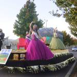 Royalty (from left) prince Logan Laxson, princess Brii Hingtgen, princess Alicia Pairadee and queen Lindsey Coffman wave to a virtual crowd on Sequim-Dungeness Way during the Sequim Irrigation Festivals makeshift Grand Parade on Saturday, Oct. 10. Sequim Gazette photo by Michael Dashiell