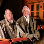 Carol and David Willis avatars enjoy a show. Photo courtesy of Olympic Theatre Art Center