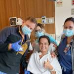 Melissa Smith, recovering from lungs and liver transplants, joins some of her caregivers in smiles after removal of her feeding tube on Nov. 10. Submitted photo