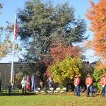Tom Ferrell, a U.S. Air Force veteran and City of Sequim deputy mayor, addresses a crowd at a special Veterans Day ceremony at Pioneer Memorial Park on Nov. 11. Sequim Gazette photo by Michael Dashiell