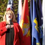 Amanda Bacon leads the National Anthem as part of the Nov. 11 Veterans Day event at Pioneer Memorial Park on Nov. 11. Sequim Gazette photo by Michael Dashiell