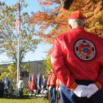 Members of the Marine Corp Leagues Mt. Olympus Detachment listen as Tom Ferrell, veteran and City of Sequim deputy mayor, addresses a Veterans Day ceremony crowd at Pioneer Memorial Park on Nov. 11. Sequim Gazette photo by Michael Dashiell
