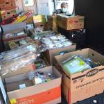 This year, the Sequim Food Banks Family Holiday Meal Bag distribution shifts to one day from 11 a.m.-2 p.m. Nov. 20 as a drive-thru at Carrie Blake Community Park. Andra Smith, the food bank executive director seen here in the facilitys new van, said they made the change to due to COVID-19 precautions while still honoring the food banks tradition of providing a meal for families for Thanksgiving. Sequim Gazette photo by Matthew Nash