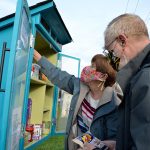Rotating teams from the Olympic Unitarian Universalist Fellowship, like Sequim couple Greg and Vicki Sensiba, take turns stocking the Little Free Pantry each day. The project started two months ago, and organizers hope its the first of many across Sequim. Sequim Gazette photo by Matthew Nash