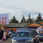 Vehicles lined up from the Albert Haller Playfields to Washington Street to receive food from the Family Holiday Meal distribution program. Sequim Gazette photo by Matthew Nash
