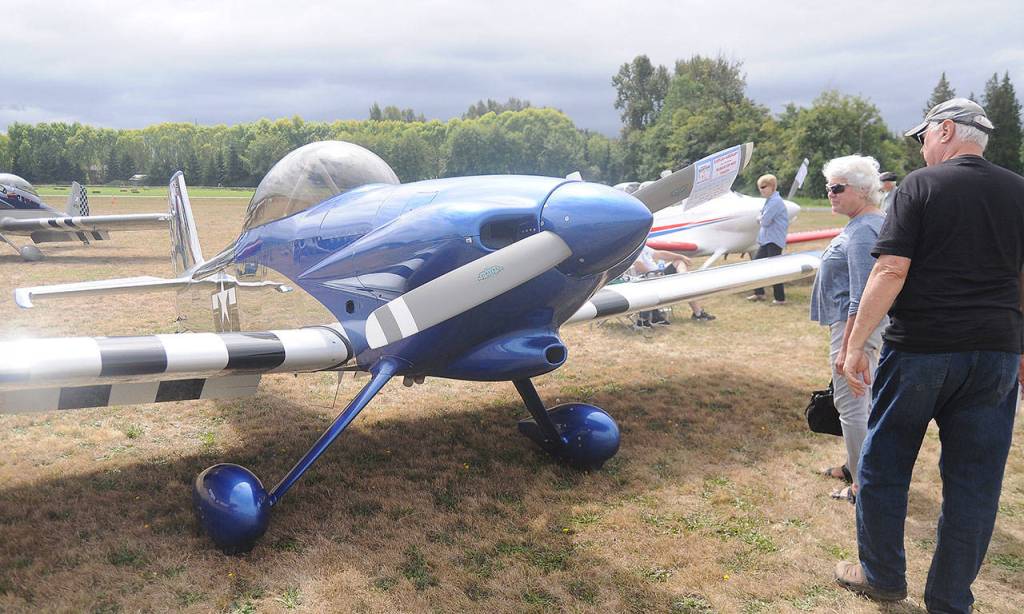 Margie and Stan Oserbauer of Sequim get a close-up look at a 2009 RV4 owned by Rick Stoffel of Sequim at the Olympic Peninsula Air Affaire and Sequim Valley Fly-In in 2019. Sequim Gazette file photo by Michael Dashiell
