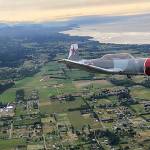 Daniel Sallee flies a Nanchang aircraft above Sequim in 2018. Photo courtesy of Andy Sallee/Sequim Valley Airport